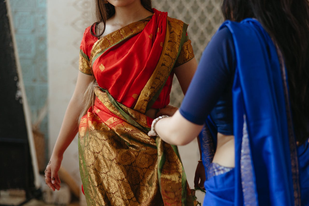 Woman in Brown and Red Saree