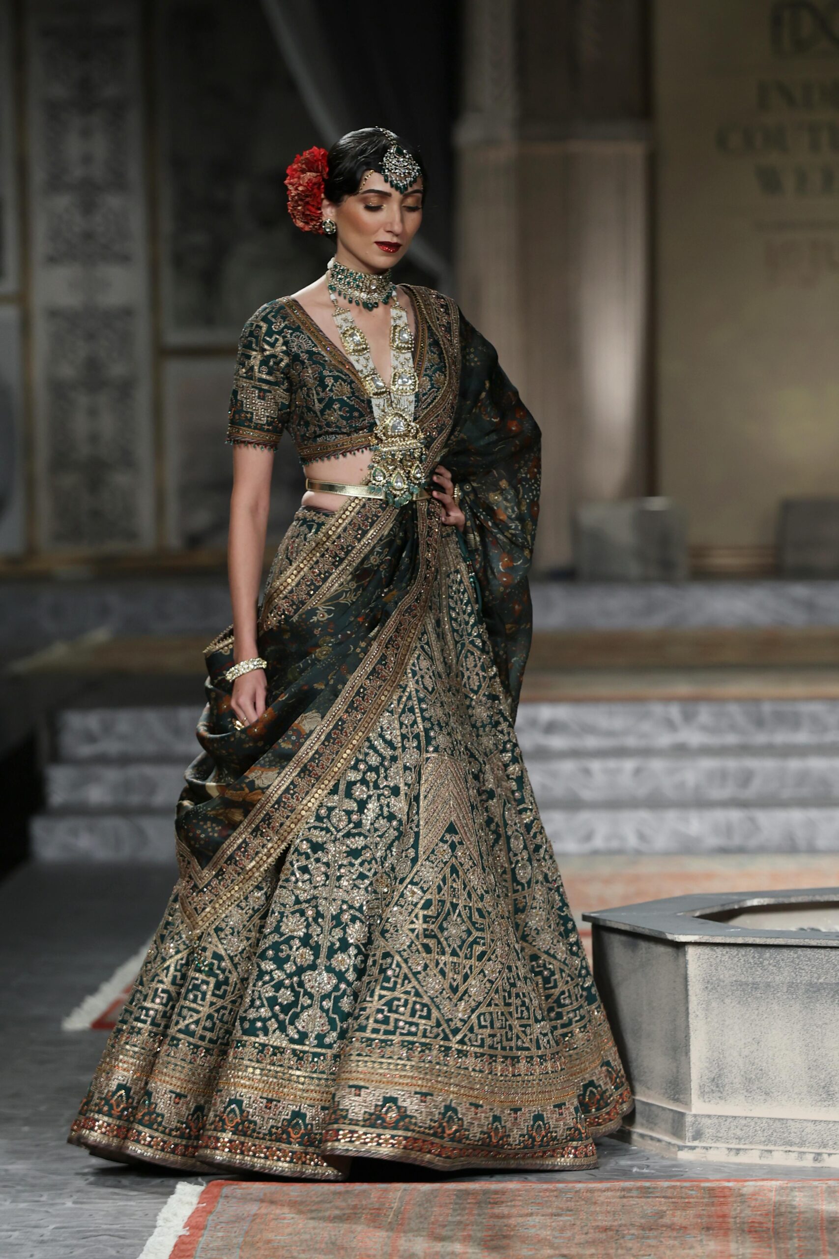 dark green colour wedding lehenga , trendy green wedding lehenga, green lehenga with golden work